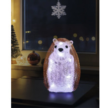 Figurine de hérisson décorative à LED en acrylique avec une surface cristalline, posée sur une table dans une pièce décorée pour Noël.