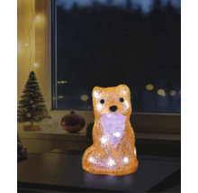 Figurine de renard décorative à LED en acrylique avec lumière blanc chaud dans une ambiance de Noël sur une table devant une fenêtre.