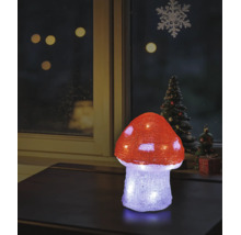Champignon décoratif LED illuminé en acrylique sur une table, décoration de fenêtre de Noël en arrière-plan.