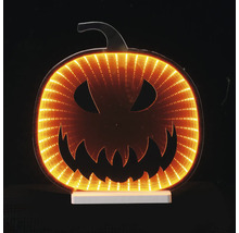 Citrouille d Halloween LED avec effet de miroir infini et visage de Jack-O-Lantern sur socle blanc.