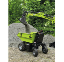 Dumper électrique Zipper chargé de gravier par un godet d'excavatrice à l'extérieur.