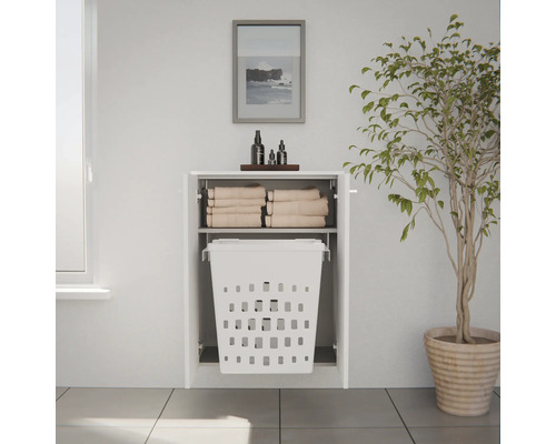 Meuble de salle de bain suspendu avec portes ouvertes, serviettes dans le compartiment supérieur et panier à linge intégré en dessous.