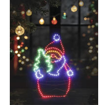 Silhouette LED lumineuse d'un Père Noël avec sapin sur un cadre en fil de fer dans un décor de Noël festif.