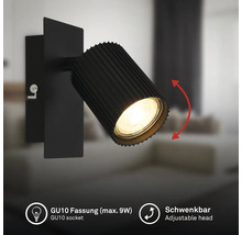 Applique murale noire avec spot nervuré orientable, douille GU10 pour un maximum de 9 Watts.