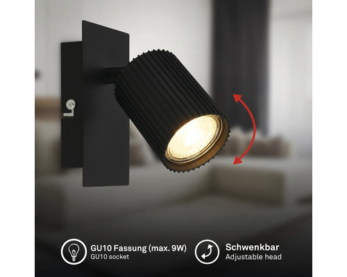 Applique murale noire avec spot nervuré orientable, douille GU10 pour un maximum de 9 Watts.