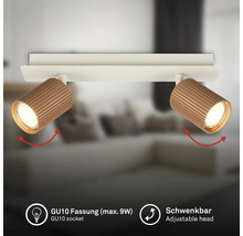 Plafonnier à deux spots orientables, surface nervurée, douille GU10 maximum 9 Watt, orientable.