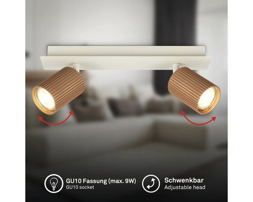 Plafonnier à deux spots orientables, surface nervurée, douille GU10 maximum 9 Watt, orientable.