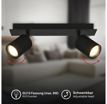 Plafonnier noir à deux spots avec têtes rainurées orientables et douille GU10 pour un maximum de 9 Watts.
