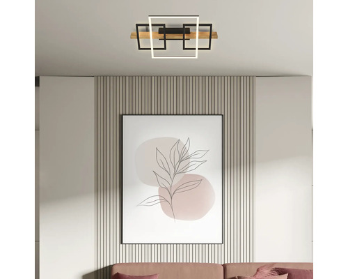 Plafonnier LED moderne avec des cadres carrés géométriques et un élément en bois, monté dans une pièce lumineuse au décor moderne.