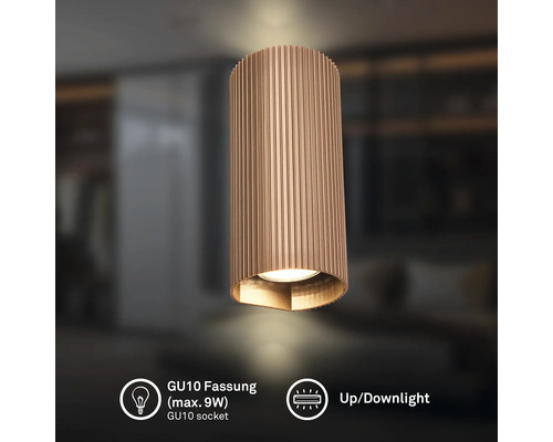 Applique murale cylindrique avec nervures verticales, douille GU10 pour maximum 9 Watts, fonction d éclairage vers le haut et le bas.