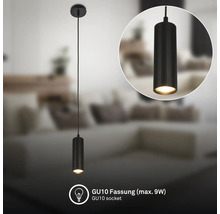 Suspension cylindrique noire avec structure rainurée, douille GU10 pour maximum 9 watts dans un salon.