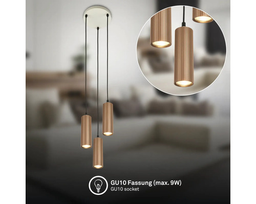 Suspension à trois lampes avec abat-jour cylindriques rainurés et douilles GU10 pour maximum 9 Watts.