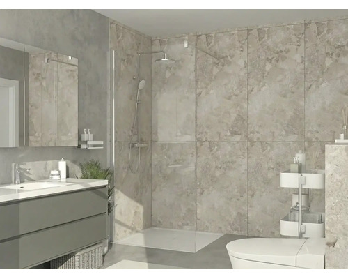 Salle de bain moderne avec douche à l'italienne, paroi en verre, grands carreaux muraux aspect pierre, meuble sous-vasque et miroir.