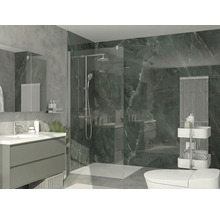 Salle de bains moderne avec douche à l'italienne en verre, meuble sous-lavabo, carrelage mural aspect marbre vert foncé et radiateur vertical.