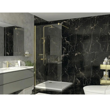 Salle de bains avec douche à l'italienne, marbre noir, robinetterie dorée, meuble sous-lavabo gris et receveur de douche blanc.