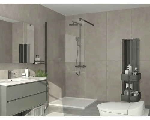 Salle de bain moderne avec douche à l'italienne, robinetterie noire, meuble sous-vasque gris et radiateur vertical sur grands carreaux gris.