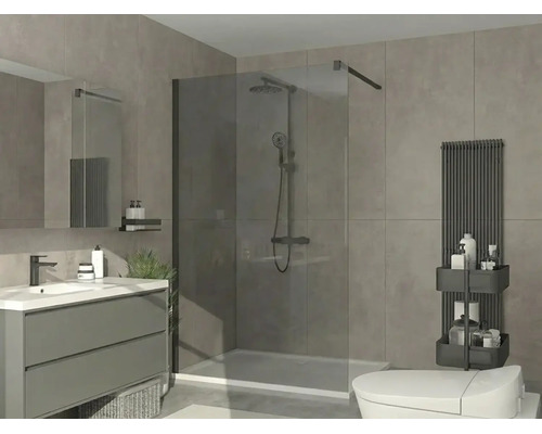 Modernes Badezimmer mit begehbarer Glasdusche, grauem Waschtisch, weißem Waschbecken, schwarzem Heizkörper und grauen Fliesen.