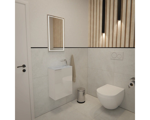 Moderne Gästetoilette mit wandhängender Toilette, Waschtischunterschrank, beleuchtetem Spiegel, hellgrauen Fliesen und Holzwandpaneelen mit Licht.