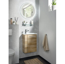WC d'invités moderne avec meuble sous lavabo suspendu aspect bois, lavabo blanc, mitigeur et miroir rond à éclairage LED.