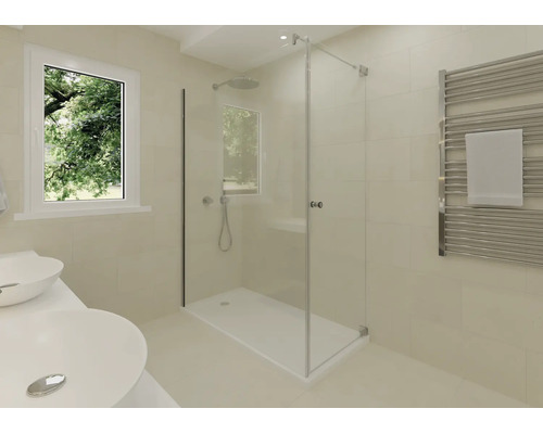 Salle de bains moderne et lumineuse avec une douche à l'italienne en verre, deux vasques à poser blanches et un radiateur sèche-serviettes chromé.