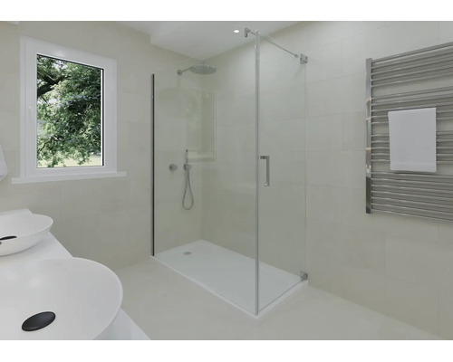 Salle de bain moderne avec cabine de douche en verre, receveur de douche blanc, double vasque et radiateur sèche-serviettes.