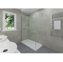 Salle de bain moderne avec cabine de douche en verre, receveur de douche blanc, radiateur sèche-serviettes et fenêtre.