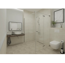 Salle de bains moderne et lumineuse avec cabine de douche en verre, WC suspendu, lavabo à poser et grand miroir mural.