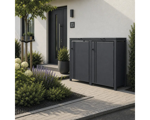 Cache-poubelle double moderne en métal dans un jardin devant une maison avec une allée pavée et des plantes.