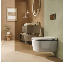 Salle de bains moderne avec toilette douche suspendue, paroi en verre, meuble sous-vasque avec lavabo, robinetterie et miroir rond.
