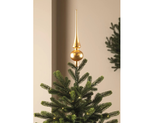 Cimier de sapin de Noël doré sur un sapin artificiel avec éclairage LED.