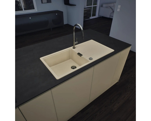 Îlot de cuisine moderne avec évier encastré beige, égouttoir et robinet haut sur un plan de travail sombre.