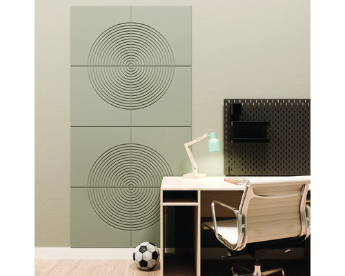 Panneaux acoustiques modernes avec un motif circulaire dans un bureau à domicile lumineux à côté d'un bureau et d'une chaise de bureau.