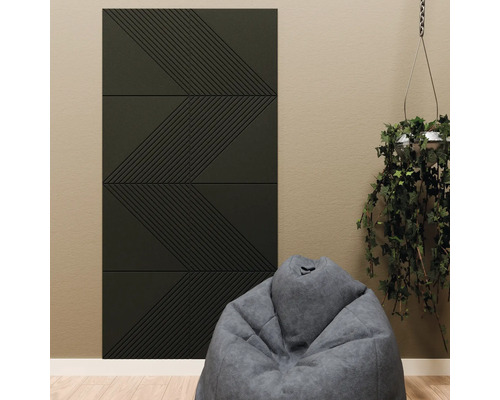 Dunkle Akustikpaneele mit geometrischem Zickzack-Muster an einer Wand in einem modernen Zimmer mit grauem Sitzsack und hängender Pflanze.