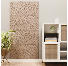 Salon moderne et lumineux avec des panneaux muraux tridimensionnels au motif ondulé, plante d'intérieur et meuble blanc avec rotin.