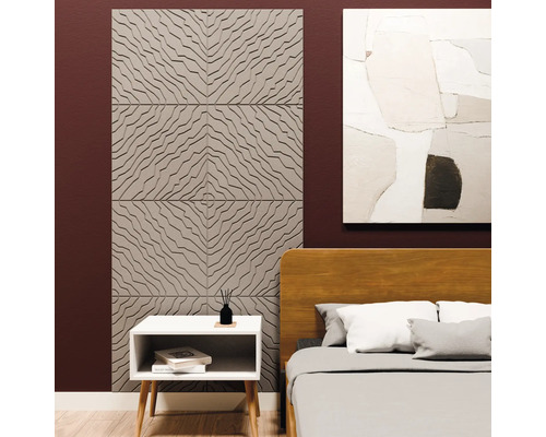 Panneaux muraux 3D avec motif de vagues géométriques dans une chambre à coucher à côté d'un lit et d'une table de nuit blanche.