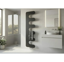 Radiateur design moderne en forme de vague dans une salle de bains lumineuse à côté d un meuble vasque avec miroir et douche en verre.