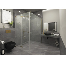 Salle de bains moderne avec carrelage gris, cabine de douche en verre avec détails dorés, WC noir et vasque avec robinet doré.
