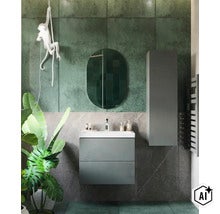 Salle de bain moderne avec meuble sous-vasque gris, miroir ovale, armoire haute et carrelage mural vert. (Image AI modified or generated)