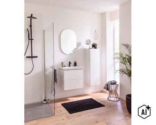 Salle de bain moderne et lumineuse avec meuble sous-vasque suspendu, miroir ovale, armoire haute et douche à l'italienne avec robinetterie noire. (Image AI modified or generated)