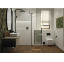 Salle de bain moderne avec douche à l'italienne, lavabo, WC suspendu et sèche-serviettes, combinant aspect bois et papier peint feuillage.