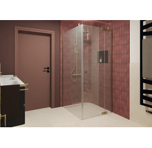 Moderne Eckdusche mit Echtglas und metallischen Profilen in einem Badezimmer mit roten Fliesen und Armaturen.