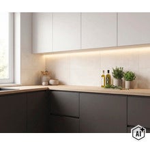 Cuisine moderne avec placards muraux clairs, meubles bas sombres, plan de travail en bois et éclairage LED sous les meubles. (Image AI modified or generated)
