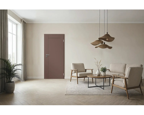 Moderne Innentür in einem hellen Wohnzimmer mit Sitzgruppe aus Sesseln und Sofa sowie Pendelleuchten aus Rattan auf einem Holzboden.