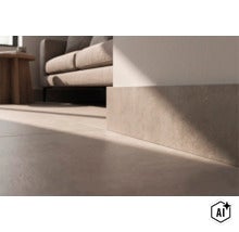 Wohnraum mit verlegten Fliesen und passender Sockelleiste in Steinoptik an der Wand, moderner Einrichtungsstil mit Sofa im Hintergrund (Image AI modified or generated)