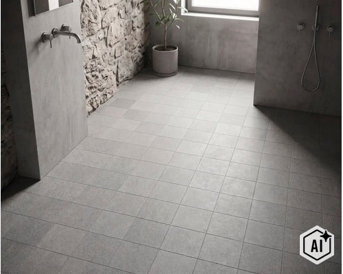 Badezimmer mit quadratischen Bodenfliesen in Steinoptik, Natursteinwand und moderner Sanitärausstattung. (Image AI modified or generated)