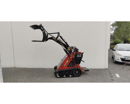 Chargeuse compacte avec godet et chenilles