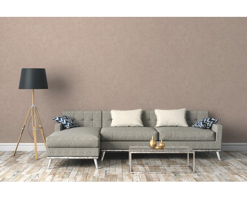 Wohnzimmer mit grauem Ecksofa, Stehlampe und Couchtisch