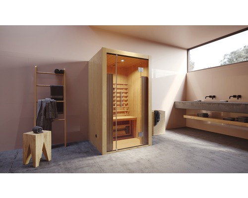 Sauna en bois avec porte en verre dans une salle de bain
