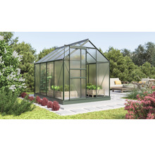 Gewächshaus im Garten mit Pflanzen und Sitzbereich