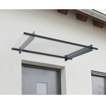 Vordach aus Metall und Glas über einer Haustür